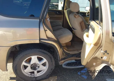 2003 GMC Envoy Sle z USA, uszkodzony, nr VIN 1GKDS13S932227974